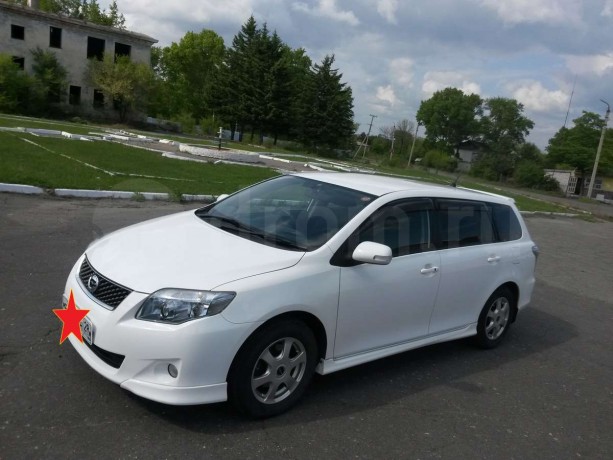 Накладки (клыки) на передний бампер (сток) Toyota Corolla (141) купить недорого с доставкой в Красноярск