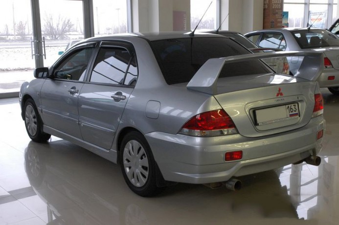 Бампер задний "Demo Concept" Mitsubishi Lancer купить недорого с доставкой в Красноярск