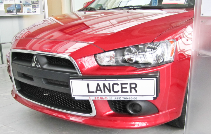Рамка под номер на передний бампер (текстурный пластик) для Mitsubishi Lancer X (2010-2016) купить недорого с доставкой в Красноярск
