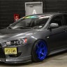 Спойлер переднего бампера (под клыки) для Mitsubishi Lancer X купить недорого с доставкой в Красноярск