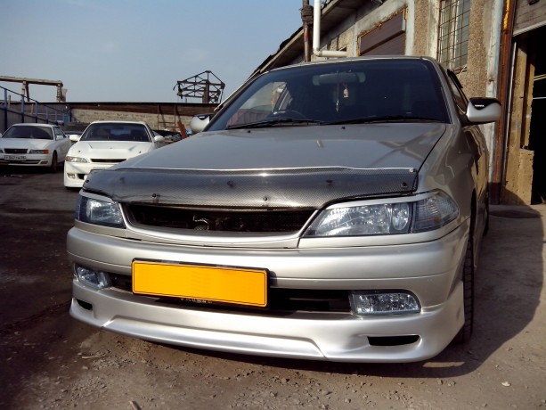 Накладка на передний бампер Toyota Carina (210) Рестайлинг купить недорого с доставкой в Красноярск